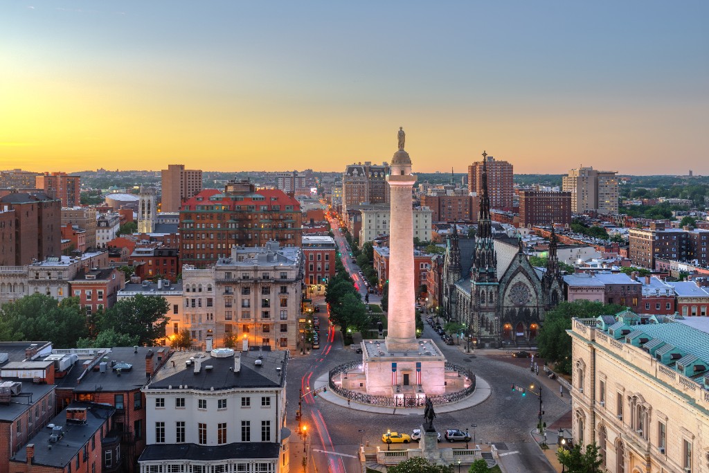 Baltimore city skyline at sunset with the Washington Monument